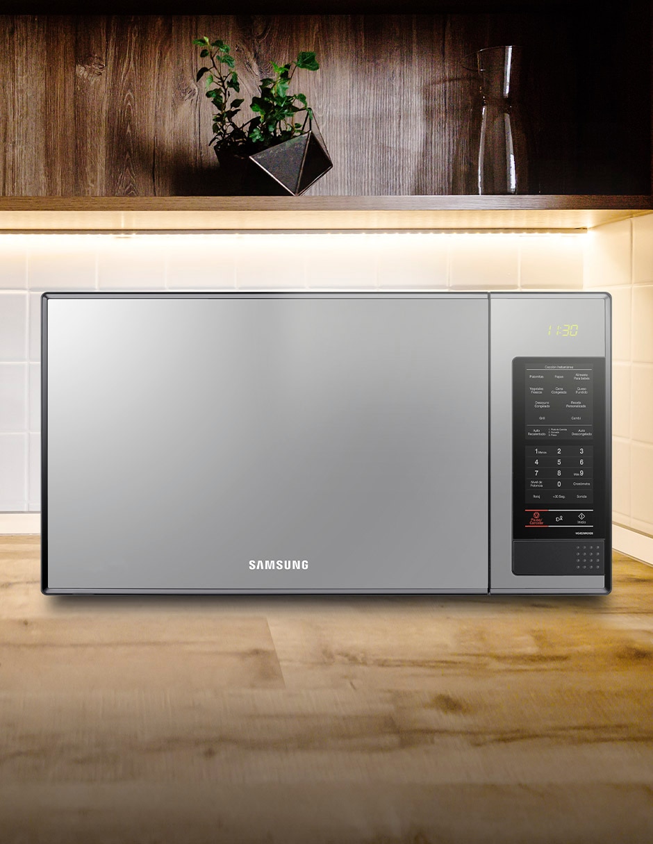 Horno de microondas con grill modelo MG402MCDXBB/AX de 1.4 pies cúbicos